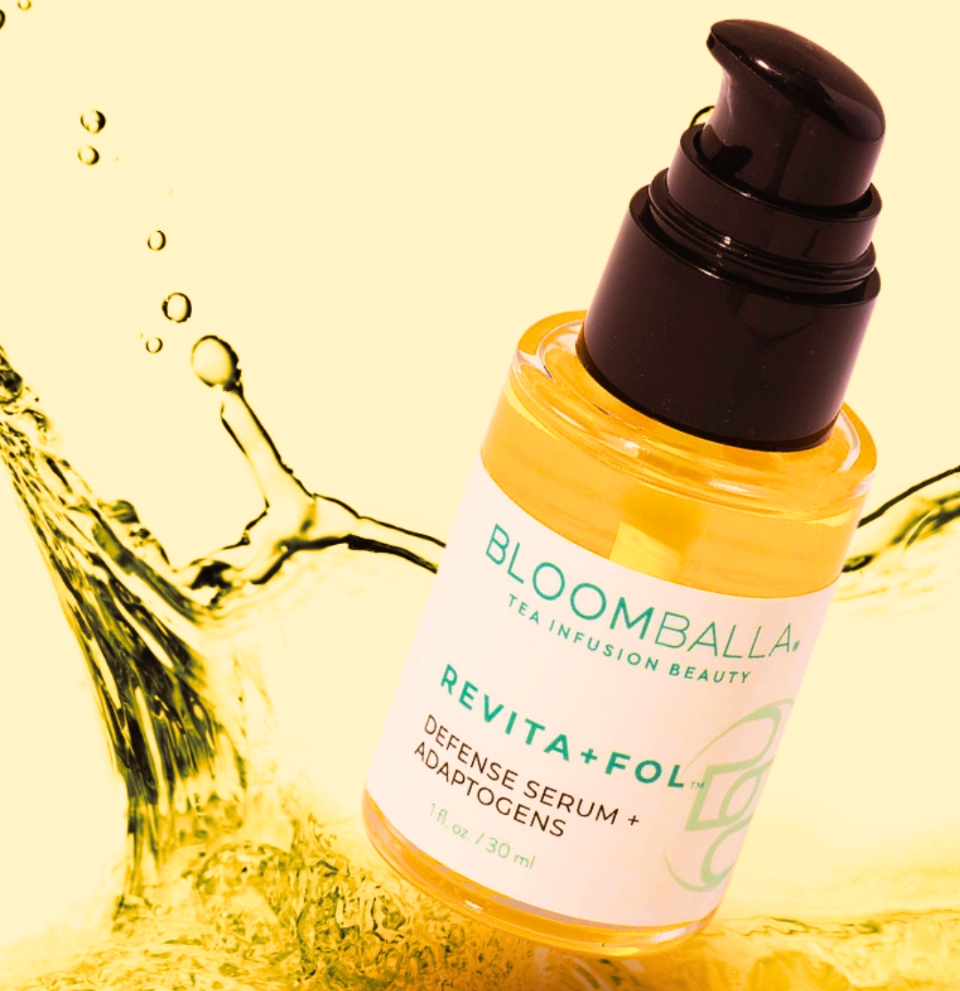 Close-up of Bloomballa's  adaptogenic antioxidant scalp serum bottle