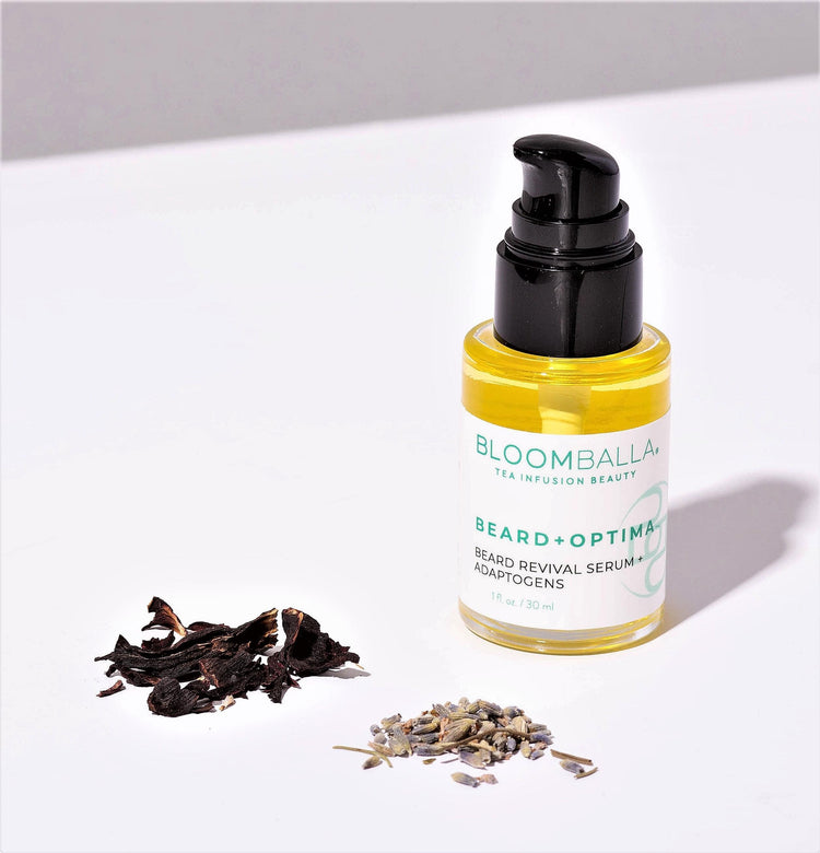 Herbs and bottle of Beard Optima beard growth supplement 