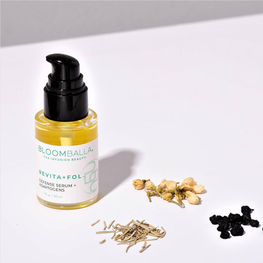 herbs and botte of Revita+Fol™ antioxidant scalp oil for hair growth